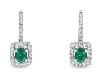 18K Gold Emerald And Diamond Halo Dangle And Drop Earrings. Oval Shaped Emerald And Diamond Halo Dangle And Drop Earrings. Gold Earrings.