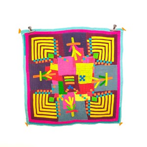 May include: A colorful patchwork quilt with a geometric design. The quilt is made of various fabrics in shades of pink, red, yellow, green, blue, and purple. The quilt is stitched together with a variety of patterns, including squares, rectangles, and triangles.