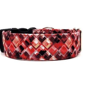 May include: Red, orange, and black geometric patterned dog collar with a black buckle.
