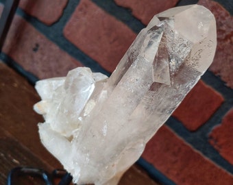 Clear Quartz Point on Metal Pin Stand