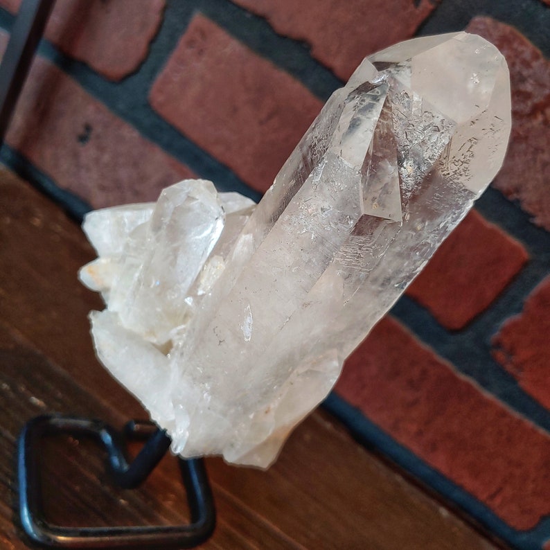 Clear Quartz Point on Metal Pin Stand image 1