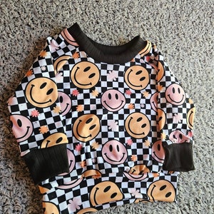 Smiley Face Raglan Shirt: Pastel Checkered Long Sleeve Tee