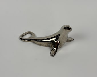 Vintage Silver Chrome Seal Bottle Opener