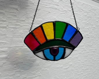 Stained glass rainbow eye sun catcher, glass art with black patina and chain, glass eyeball