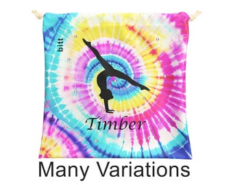 Bolsa de agarre para gimnasia con variaciones de silueta de gimnasta. Bolsa de agarre personalizada con efecto tie-dye. Bolsa de parada de manos para gimnasia para niñas y opciones con cristales.
