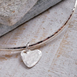 Bangle bracelet with heart shape pendants in silver sale