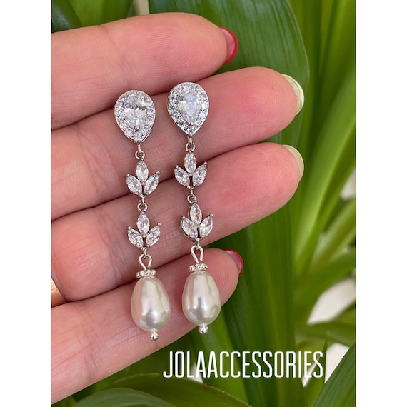 Swarovski pearl earrings best sale