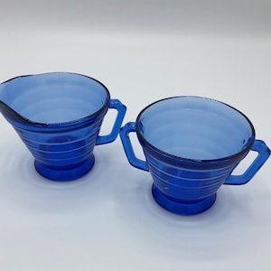 Crema de vidrio azul cobalto y azucareros