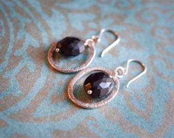 Sterling silver earrings with facetted black onyx