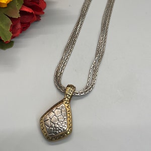 Vintage Premier Designs silver and gold tone pendant on 4 silver strands necklace