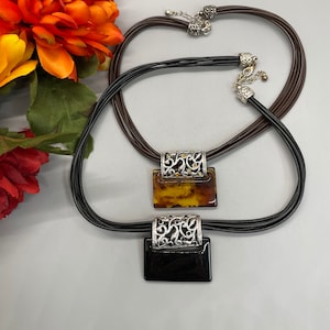 Vintage choker necklaces in black and brown.