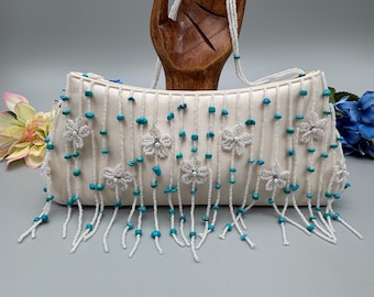 NYHET - Valerie Stevens Elfenbensfärgad och turkos aftonväska