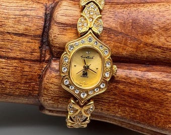 Vintage Gloria Vanderbilt Quartz Gold Tone Watch With  display picture 1