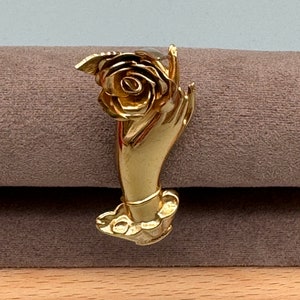 Vintage Coro Hand die eine Rose Brosche hält