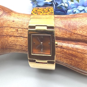 Vintage Joan Rivers Leopard Print Acrylic Cuff Watch