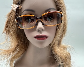 Gafas de sol de encaje español de Brighton, montura de carey hecha a mano en lata de Brighton.