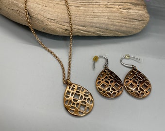 Fossil copper pendant necklace and dangling earring set