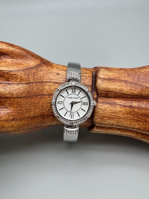 Anne Klein Crystal Silver Bangle Watch: Japanese Quartz  display picture 1