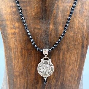 May include: A handmade wooden sign with the word "Welcome" in a playful font. The sign has a distressed finish and a simple, rustic design, suitable for a front door or entryway. The sign is approximately 30 cm wide.