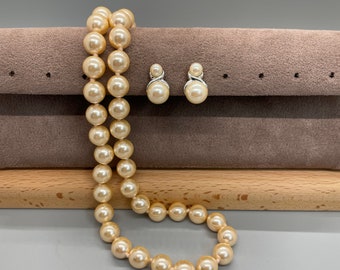 Joan Rivers soft light peach colored 9mm faux pearls with matching clip on earrings