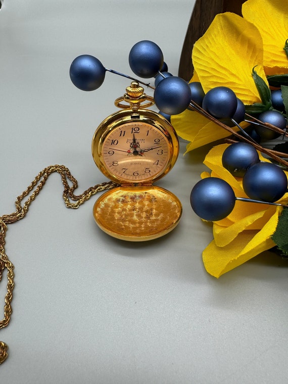 Vintage Joan Rivers Gold tone pocket watch w chain