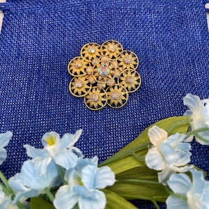 Vintage - Midcentury sunburst brooch with AB iridescent crystals