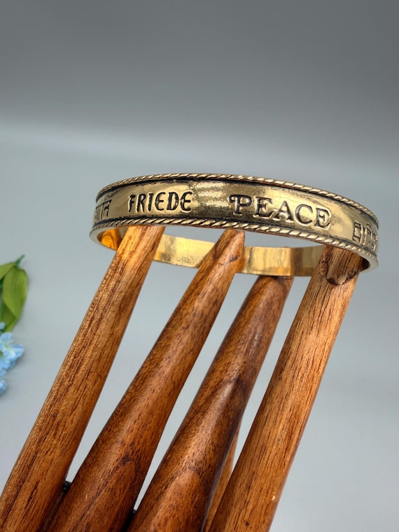 Vintage Avon Peace Bangle Bracelet, Gold Tone Multilingual "Let There Be Peace" Inscription