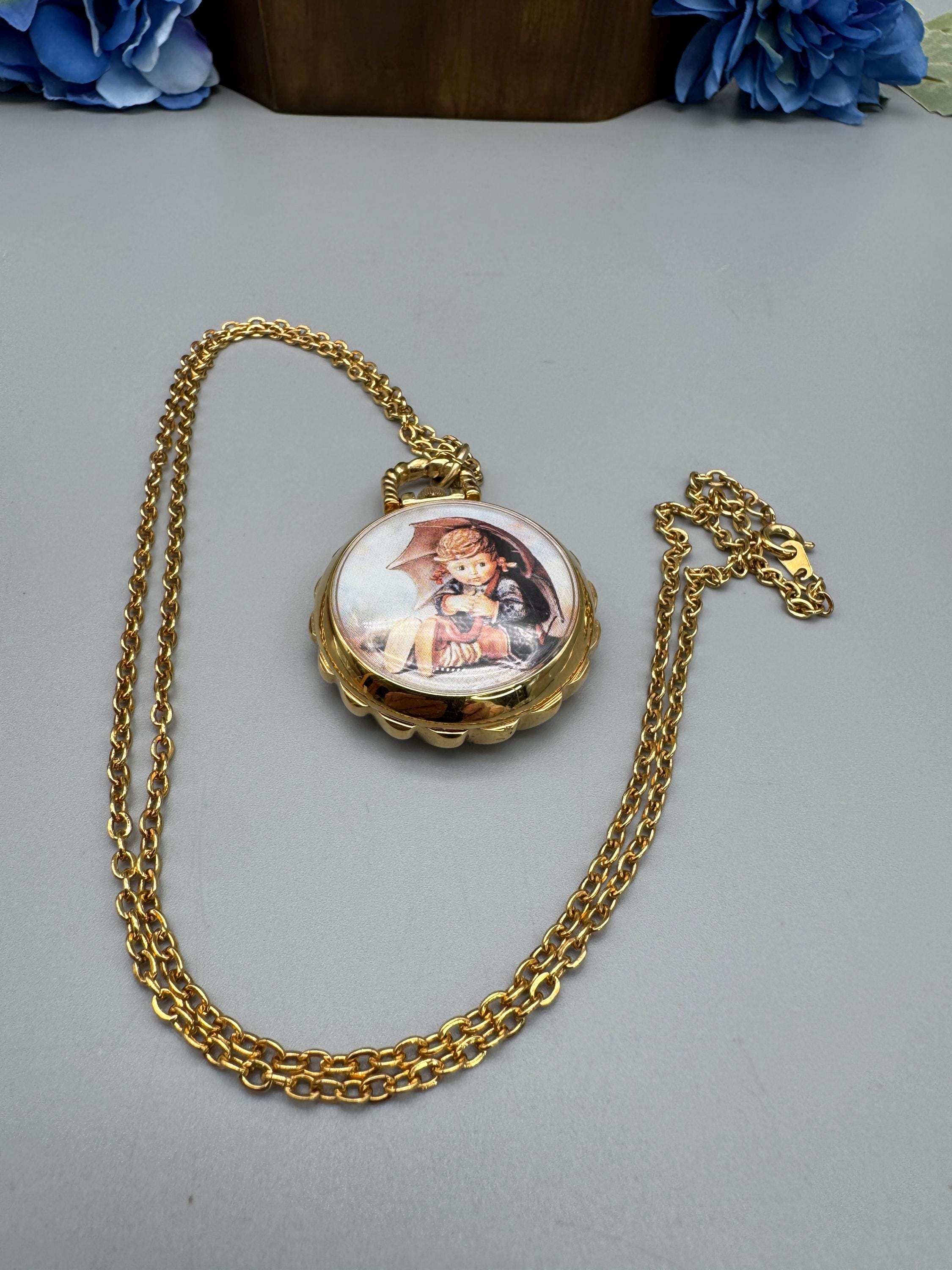 M l Hummel: ‘’Follow the Leader”  Hummel duo set pocket watch necklace Vintage NEW - Vintage MJ Hummel Umbrella Girl Pocket Watch Necklace  main image 3