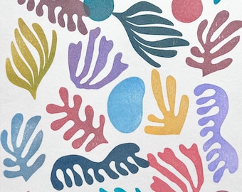 May include: Abstract art print featuring a variety of colorful shapes and patterns, including leaves, branches, and circles. The print is done in shades of blue, green, purple, red, and yellow.