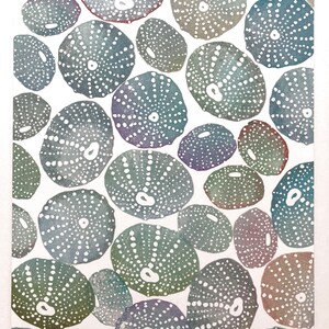 May include: Watercolor painting of a pattern of sea urchins in shades of blue, green, and purple on a white background.
