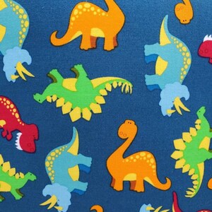May include: Blue fabric with a repeating pattern of colorful dinosaurs. The dinosaurs are in various poses, including standing, walking, and running. The fabric is perfect for crafting projects, such as making quilts, pillows, and tote bags.