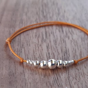 Gift idea woman, bracelet cord silver pearls