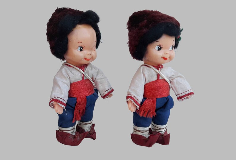 a pair of dolls of a boy and girl