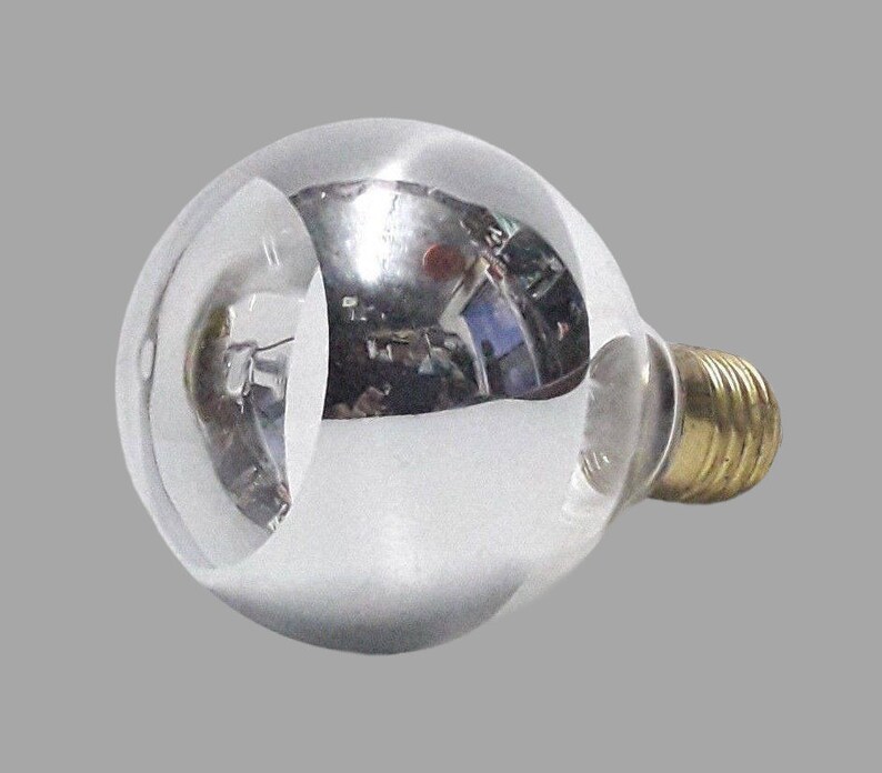 a close up of a light bulb on a gray background
