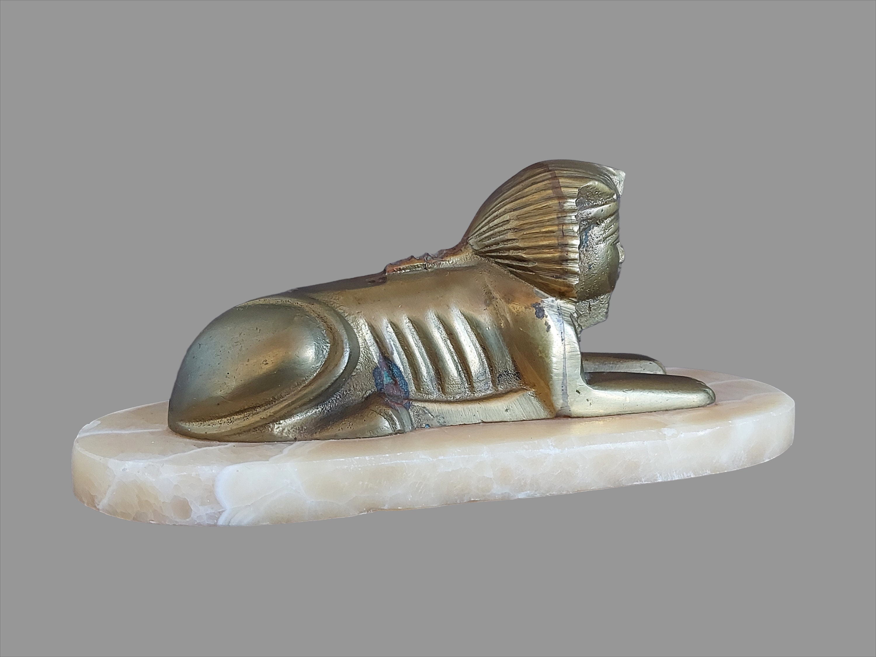 ヴィンテージ真鍮製スフィンクス像 エジプト大理石台座彫刻 ヴィンテージ真鍮製スフィンクス像：エジプト大理石台座彫刻 - Etsy 日本