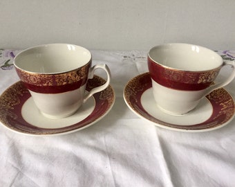 Elegant pair of H Aynsley Fountainebleau Teacup and Saucer