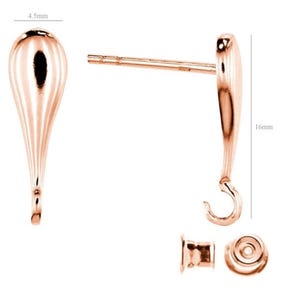 May include: Rose gold teardrop earring with a hook closure. The earring measures 16 mm in length and 4.5 mm in width. The earring is shown with a back post and a butterfly back.