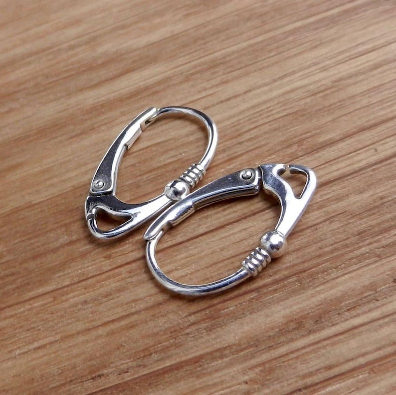 Sterling silver leverback earrings.