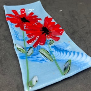 Red Poppies 17; Modern fused art glass plate, dish, spoon rest made with glacier streaky blue, green, red and black glass