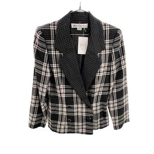 May include: A black and white plaid blazer with a contrasting black polka dot collar and lapel. The blazer has a double-breasted design with two rows of buttons and a tag attached. The jacket is hanging on a hanger against a white background.