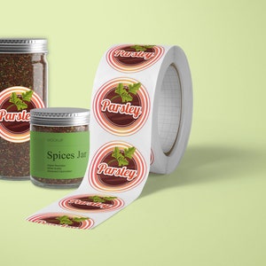 May include: Roll of round white stickers with a red, orange, and white design featuring a green parsley sprig and the word "Parsley". Two glass spice jars with silver lids are labeled "Parsley" and "Spices Jar".