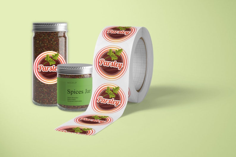 May include: Roll of round white stickers with a red, orange, and white design featuring a green parsley sprig and the word "Parsley". Two glass spice jars with silver lids are labeled "Parsley" and "Spices Jar".