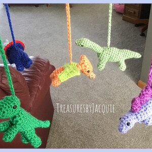 Musical Crocheted Dinosaur Baby Mobile: Apatosaurus, T-Rex
