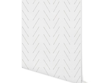 May include: White wallpaper with a repeating pattern of thin gray diagonal lines forming a chevron design.
