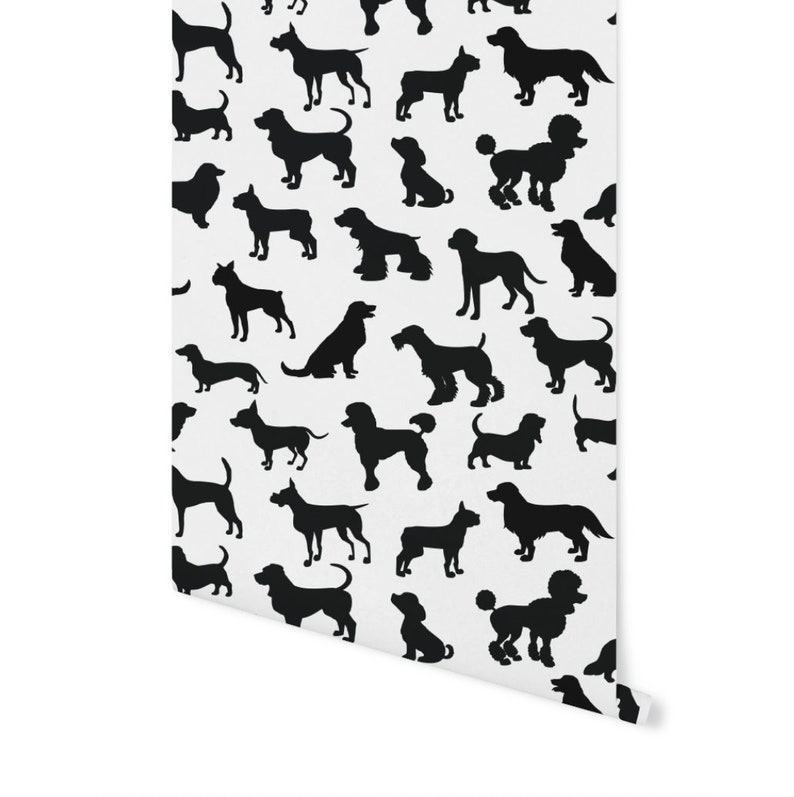May include: A white background with a repeating pattern of black dog silhouettes. The silhouettes are of different breeds of dogs, including a poodle, a dachshund, a basset hound, and a labrador.