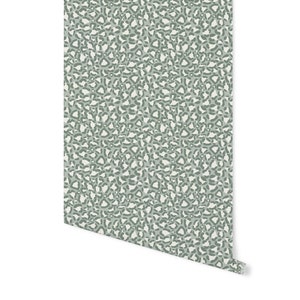 May include: A seamless pattern wallpaper with a green and white leopard print design.