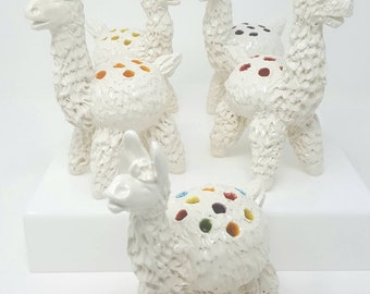 Miniatyrbordsvaser med lama och igelkott
