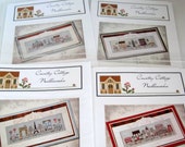 Country Cottage Needleworks set of four cross stitch patterns, Afternoon in London, Paris, Rome and New York