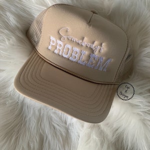Embroidery Somebody’s Problem Hat | Tan Hat White Thread