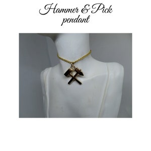 Hammer & Pick gold gilt solid pendant. Small and stylish